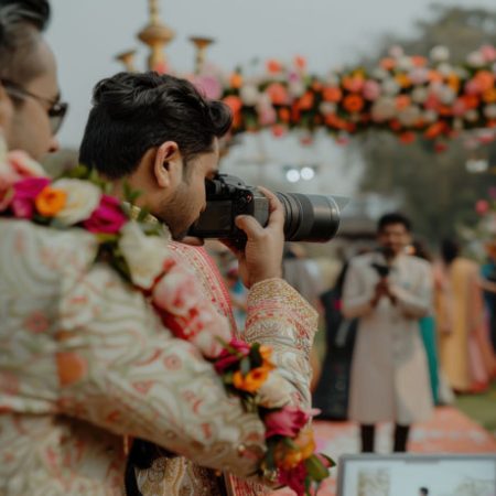 groom-being-photographed-indian-wedding-ceremony